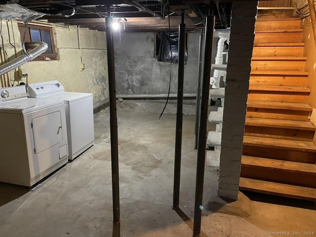 basement with separate washer and dryer