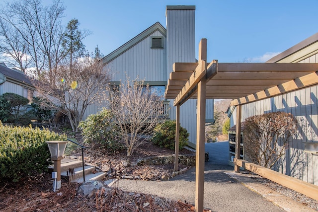 exterior space with a carport