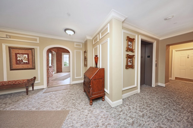 hallway featuring crown molding, elevator, and light carpet