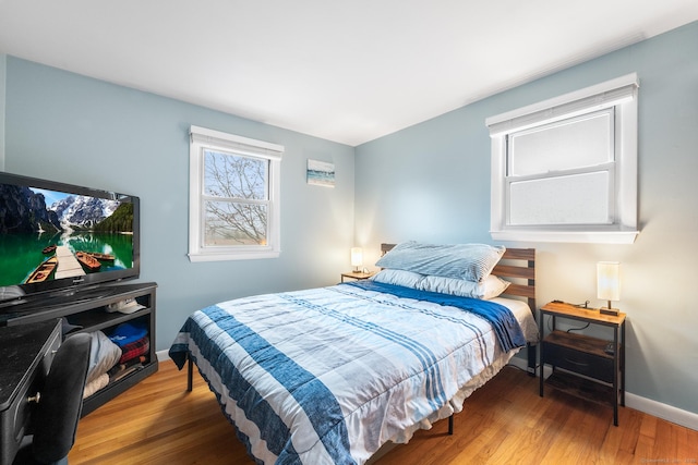 bedroom featuring hardwood / wood-style floors