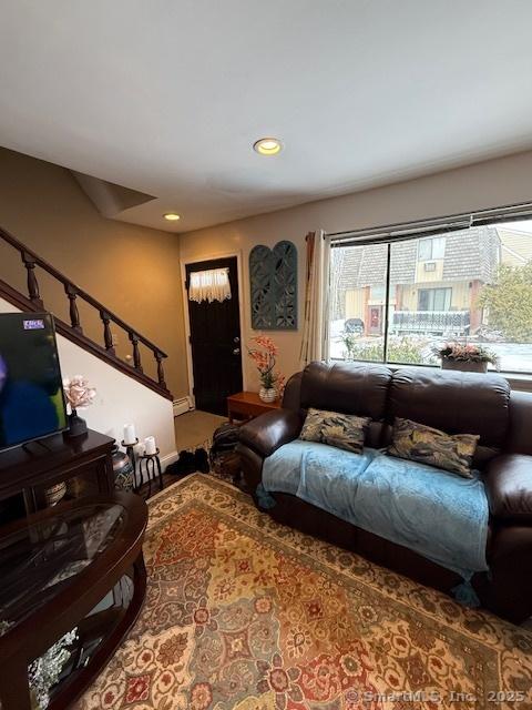 living area with recessed lighting