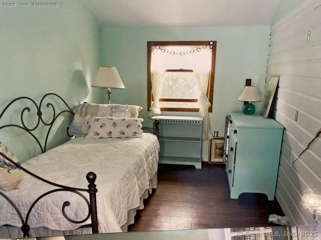 bedroom featuring dark hardwood / wood-style floors