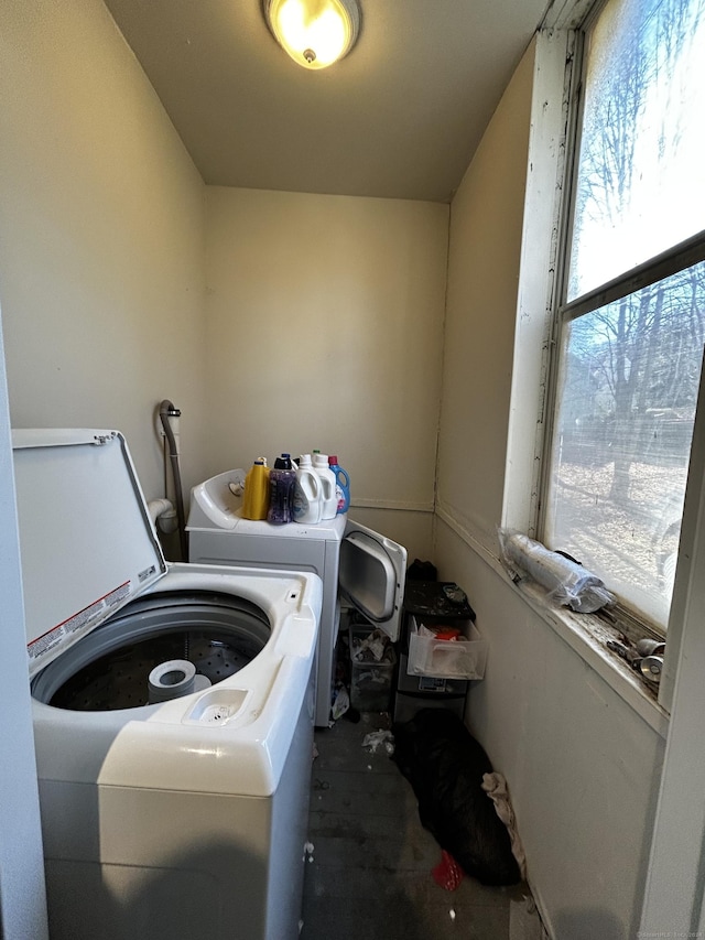 laundry room featuring separate washer and dryer