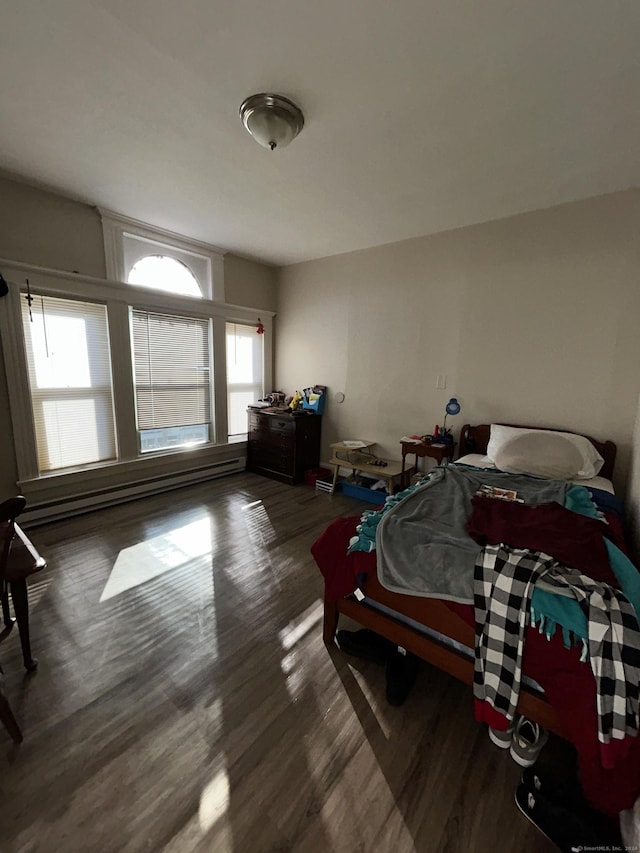 bedroom featuring dark hardwood / wood-style floors