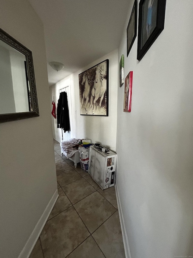 hall featuring tile patterned floors