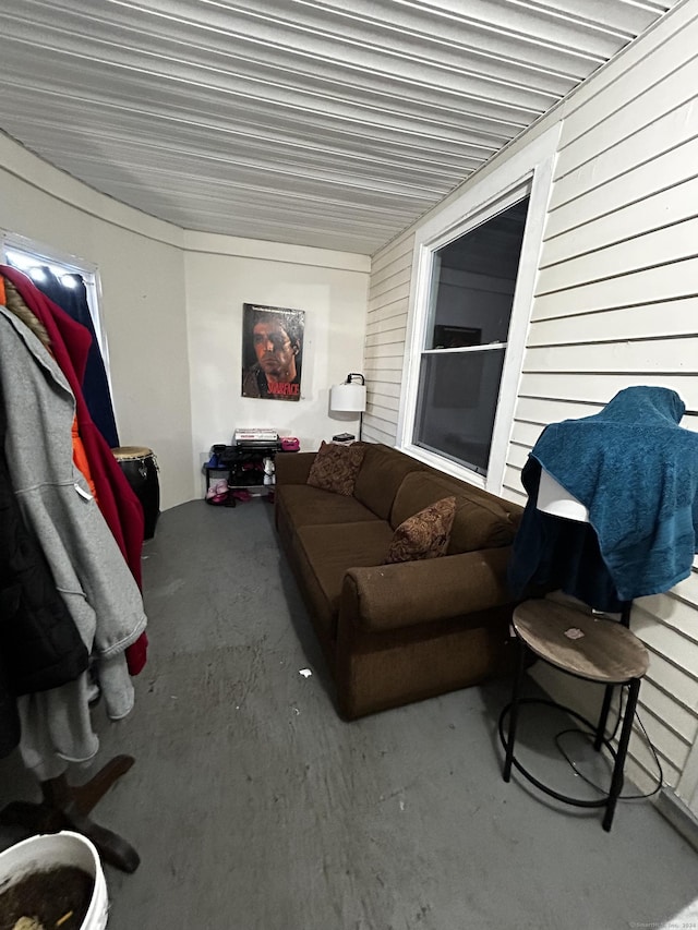 living room featuring concrete flooring