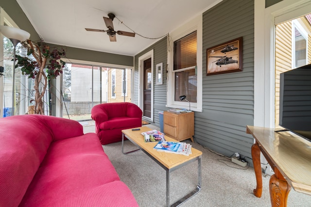 sunroom / solarium with ceiling fan