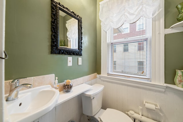 bathroom featuring sink and toilet