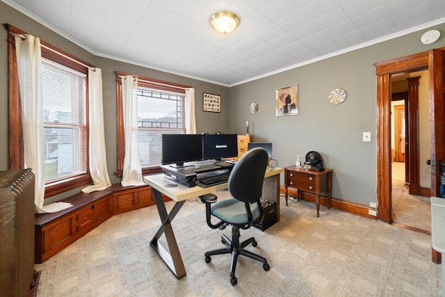 carpeted office featuring crown molding