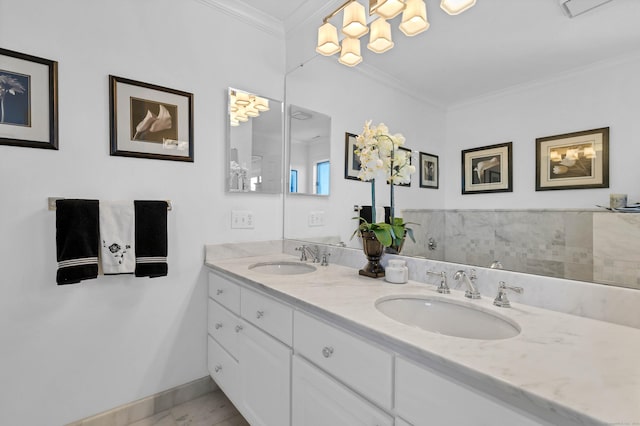 bathroom featuring vanity and crown molding