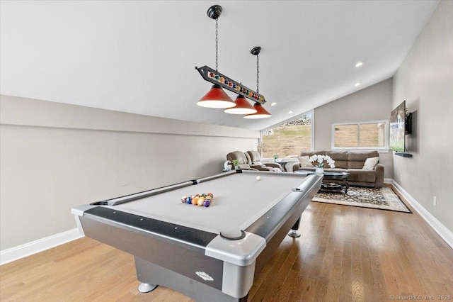 playroom with wood-type flooring, vaulted ceiling, and pool table