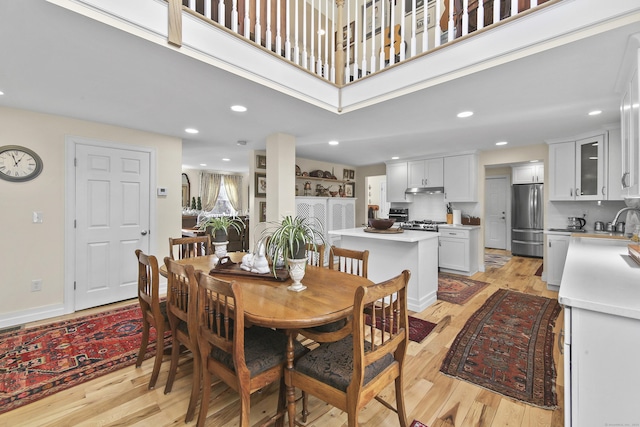 dining room with light wood-type flooring