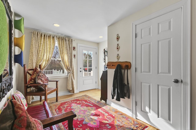 sitting room featuring light hardwood / wood-style floors