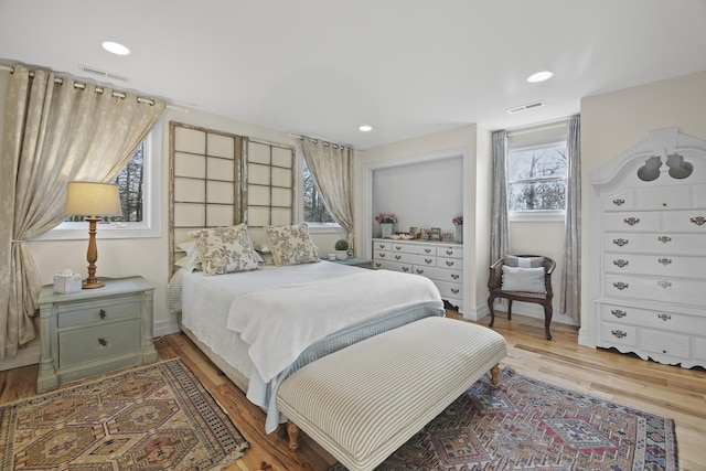 bedroom with light hardwood / wood-style flooring