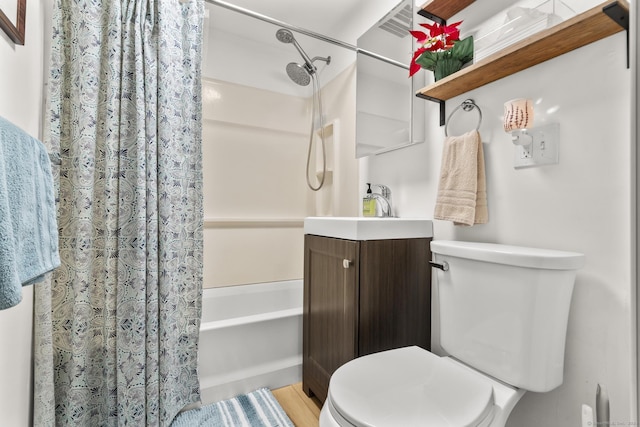 full bathroom featuring vanity, toilet, and shower / bathtub combination with curtain