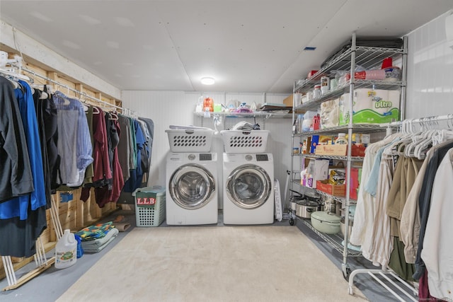 washroom featuring washing machine and clothes dryer