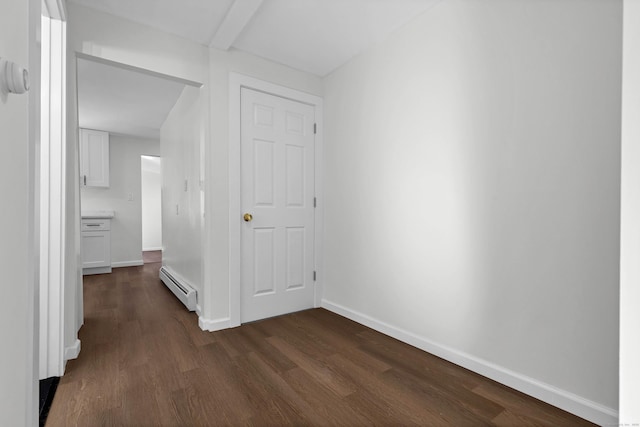 corridor with baseboards, dark wood-style floors, and a baseboard radiator