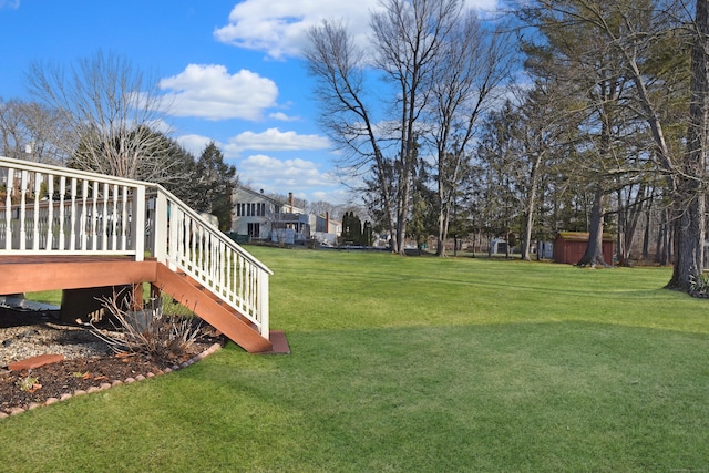 view of yard featuring a deck