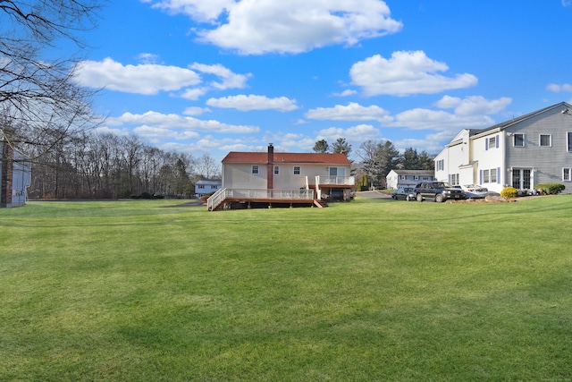 view of yard featuring a deck