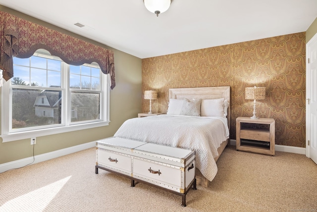 bedroom with light carpet