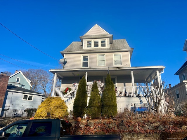 view of front of home featuring covered porch