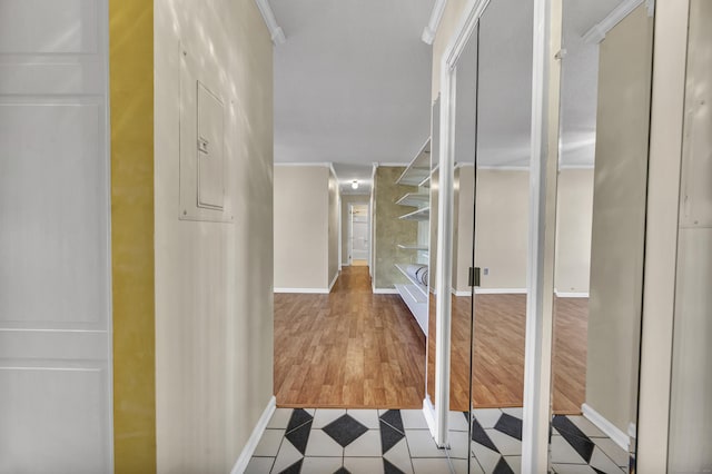 corridor featuring crown molding