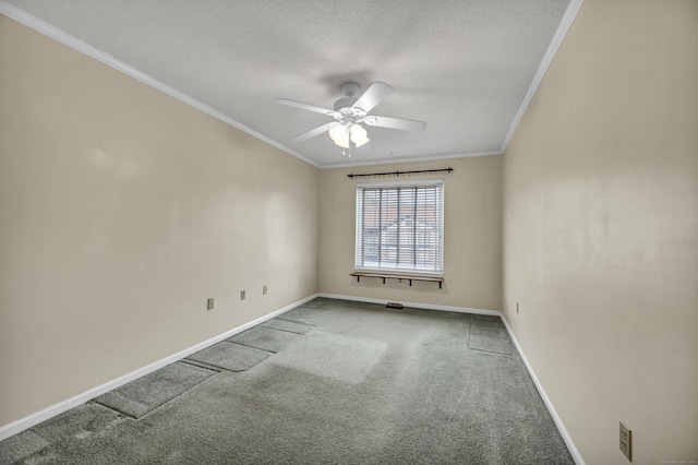 unfurnished room featuring carpet flooring, ceiling fan, ornamental molding, and a textured ceiling