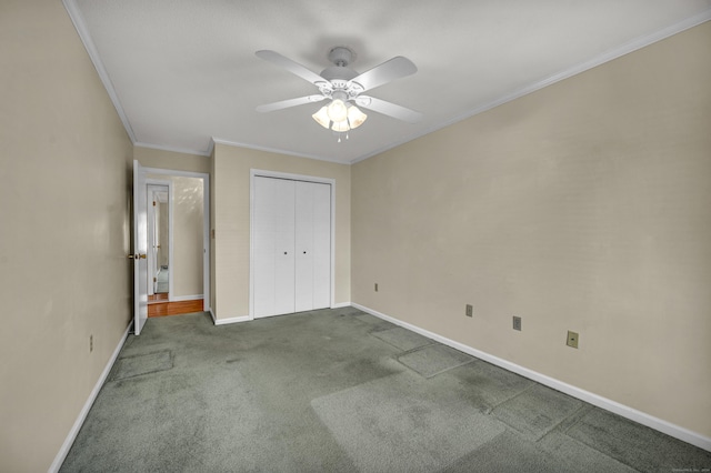 unfurnished bedroom featuring carpet flooring, a closet, ceiling fan, and crown molding