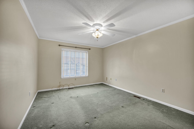 empty room featuring carpet flooring, ceiling fan, and ornamental molding