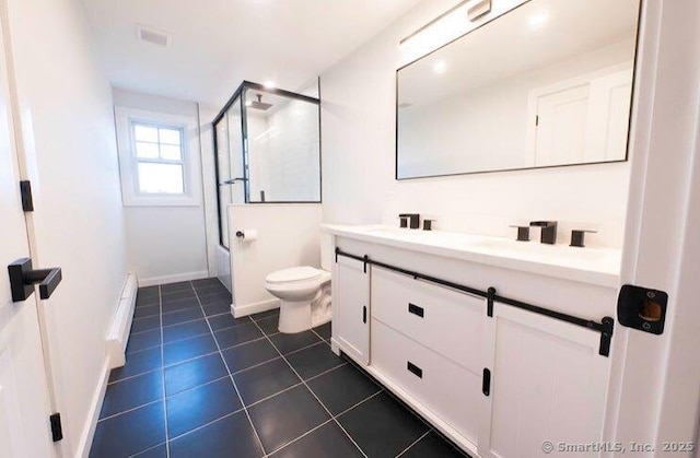 full bathroom featuring combined bath / shower with glass door, tile patterned flooring, vanity, and toilet