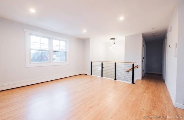 empty room featuring light hardwood / wood-style floors