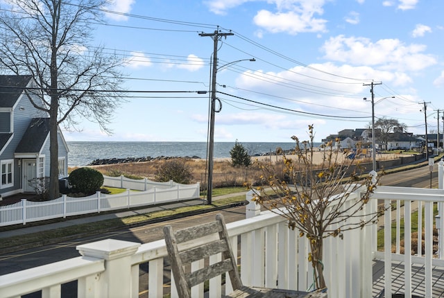 water view featuring a fenced front yard