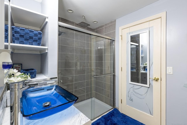 bathroom featuring an enclosed shower