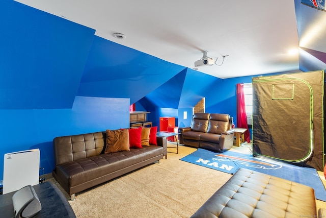 living room featuring carpet floors and vaulted ceiling