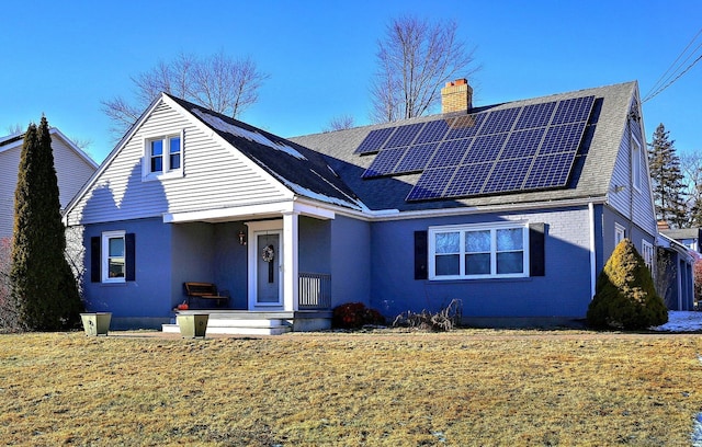 view of front property with solar panels