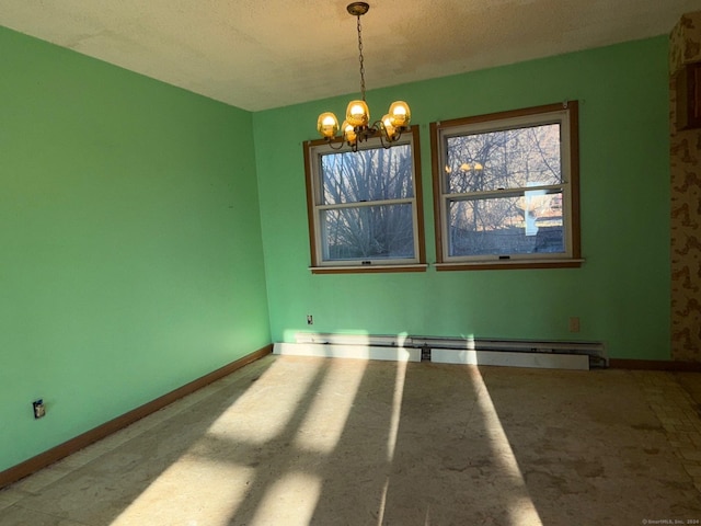 unfurnished room with a baseboard radiator, a textured ceiling, and an inviting chandelier