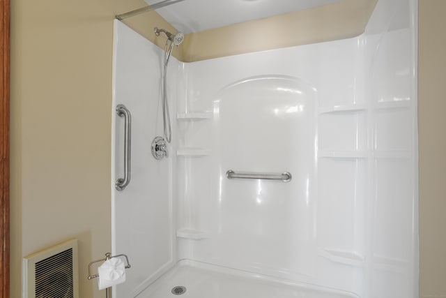 bathroom featuring a shower