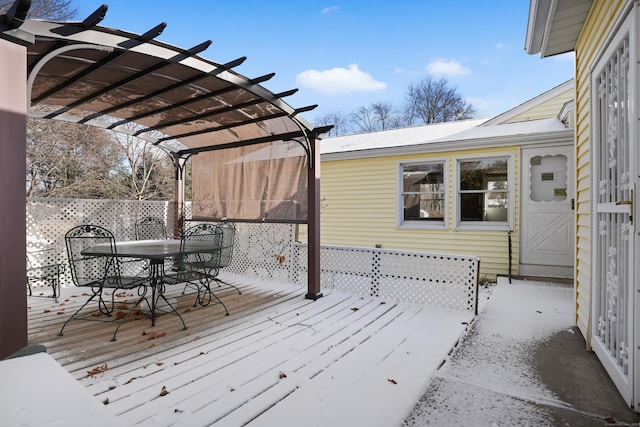 wooden terrace with a pergola