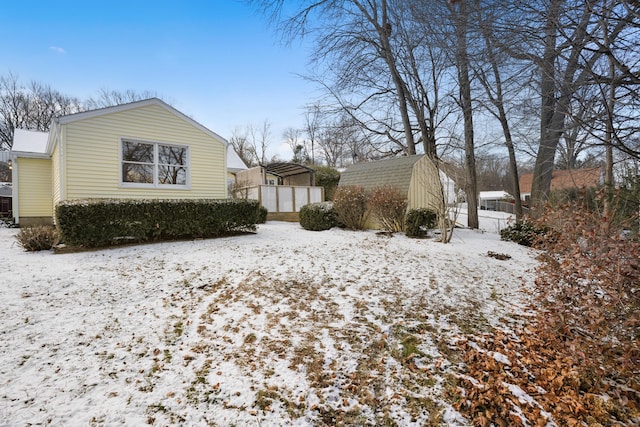 view of snow covered property