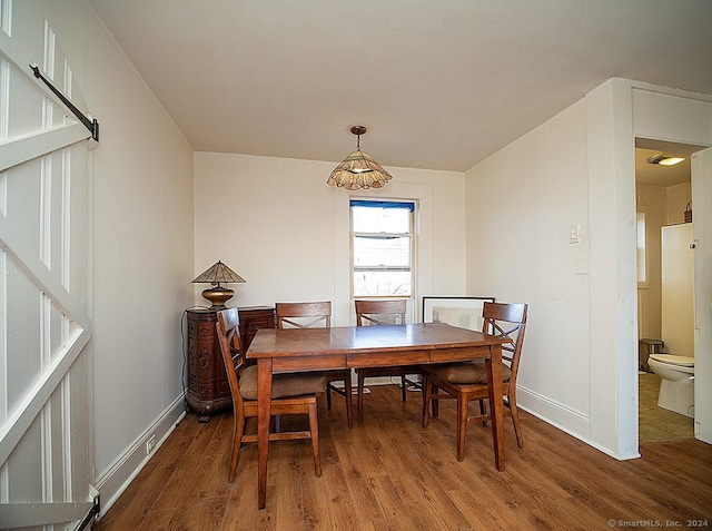 dining room featuring hardwood / wood-style flooring