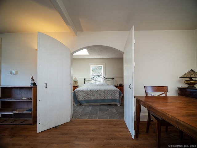 bedroom featuring dark hardwood / wood-style floors