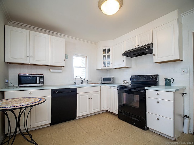 kitchen featuring black appliances, decorative backsplash, white cabinetry, and sink