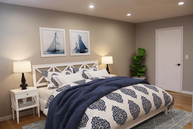 bedroom featuring hardwood / wood-style flooring