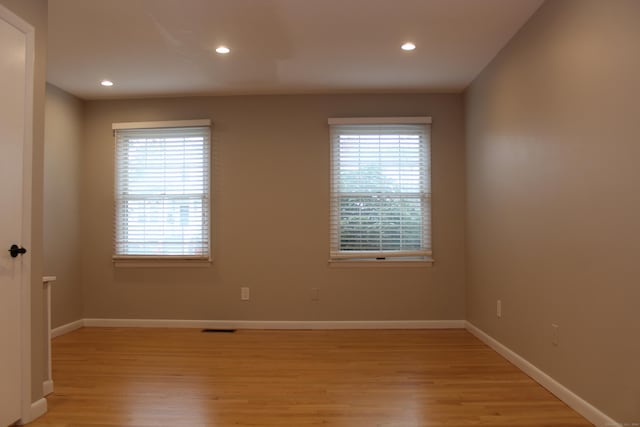 empty room featuring light hardwood / wood-style floors