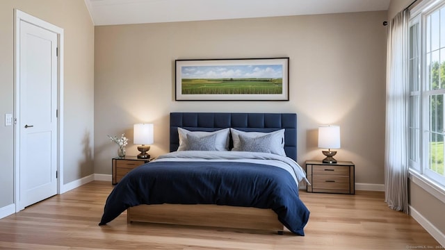 bedroom featuring light hardwood / wood-style flooring