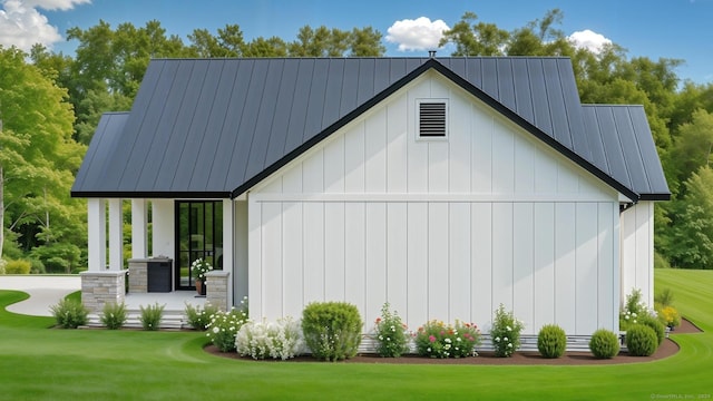 view of outbuilding with a yard