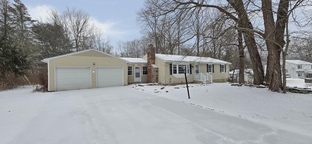 single story home with a garage