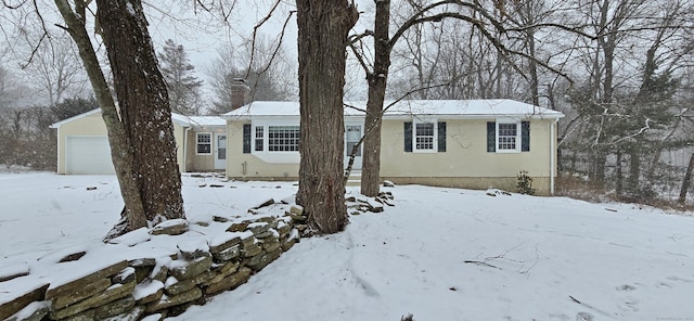 view of front of home with a garage