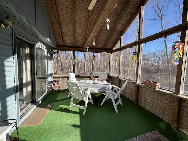 sunroom with lofted ceiling and wood ceiling