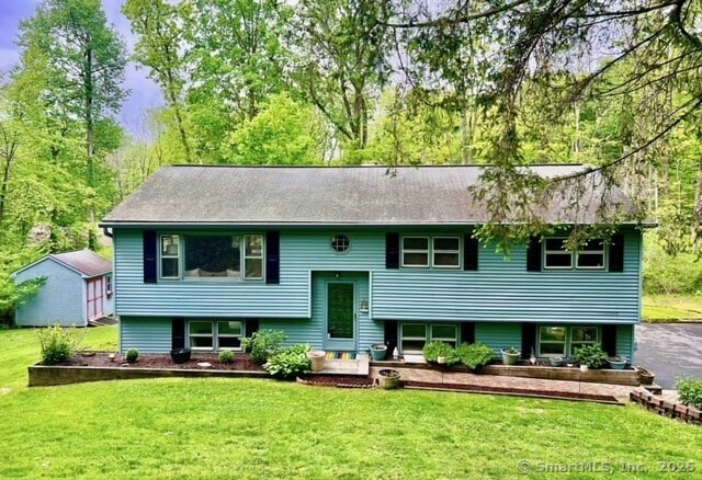 7 Varian Dr, Danbury, CT 06811 - bi-level home featuring a front lawn